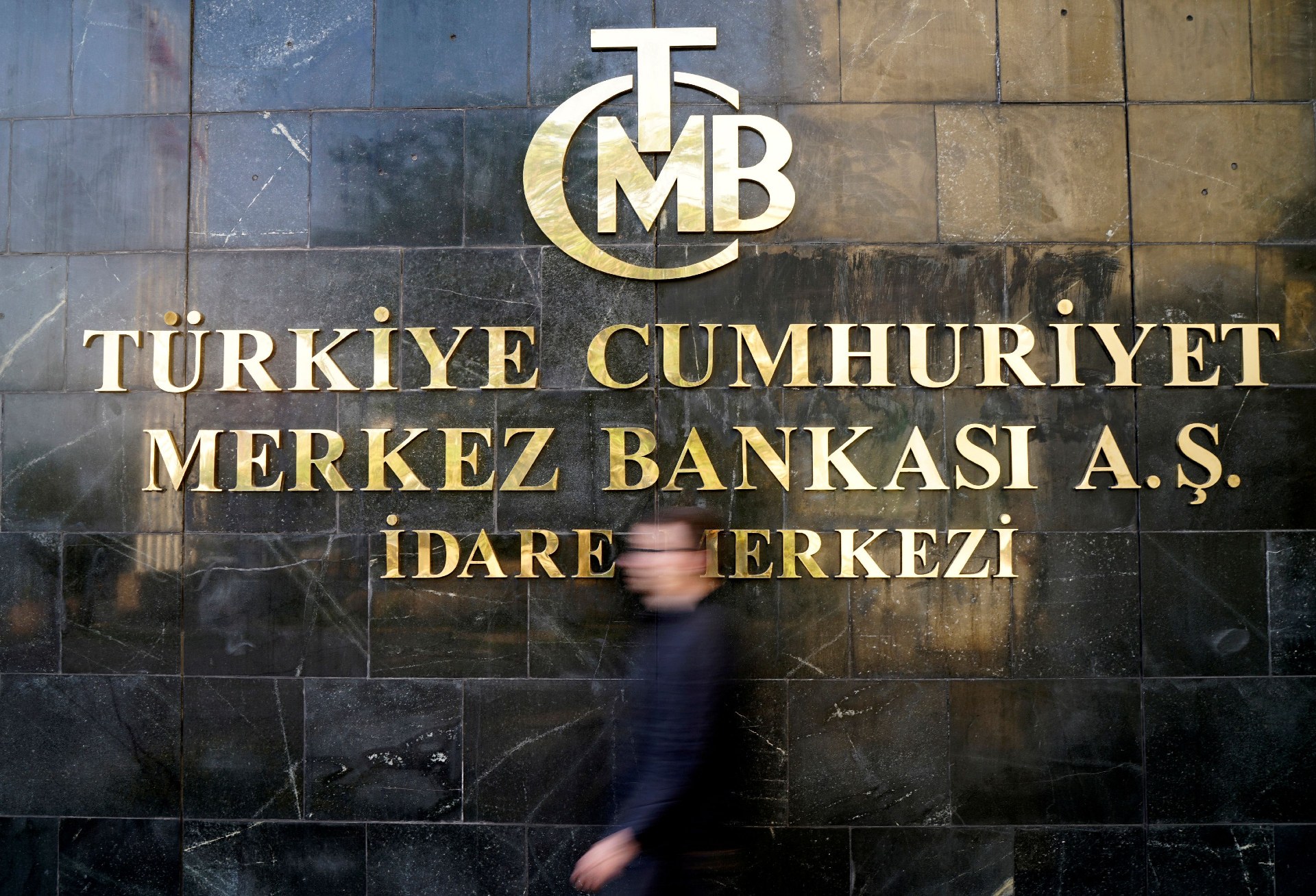 A man leaves Turkey's Central Bank headquarters in Ankara (Reuters)