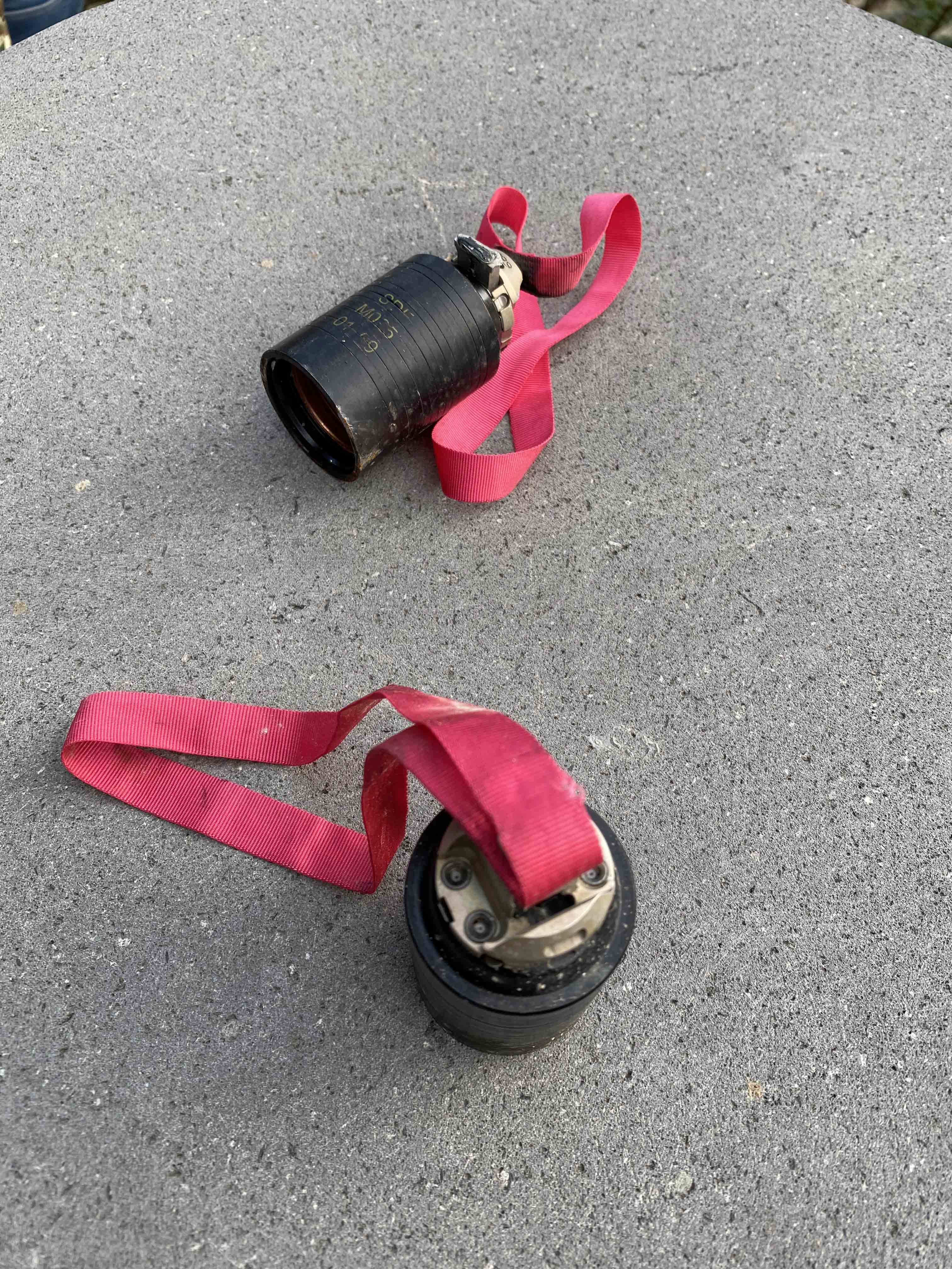 Two unexploded Israeli-made M095 submunitions, one of which is armed, in a residential area in the town of Hadrut following an attack on the city (Human Rights Watch/ Union of Informed Citizens)
