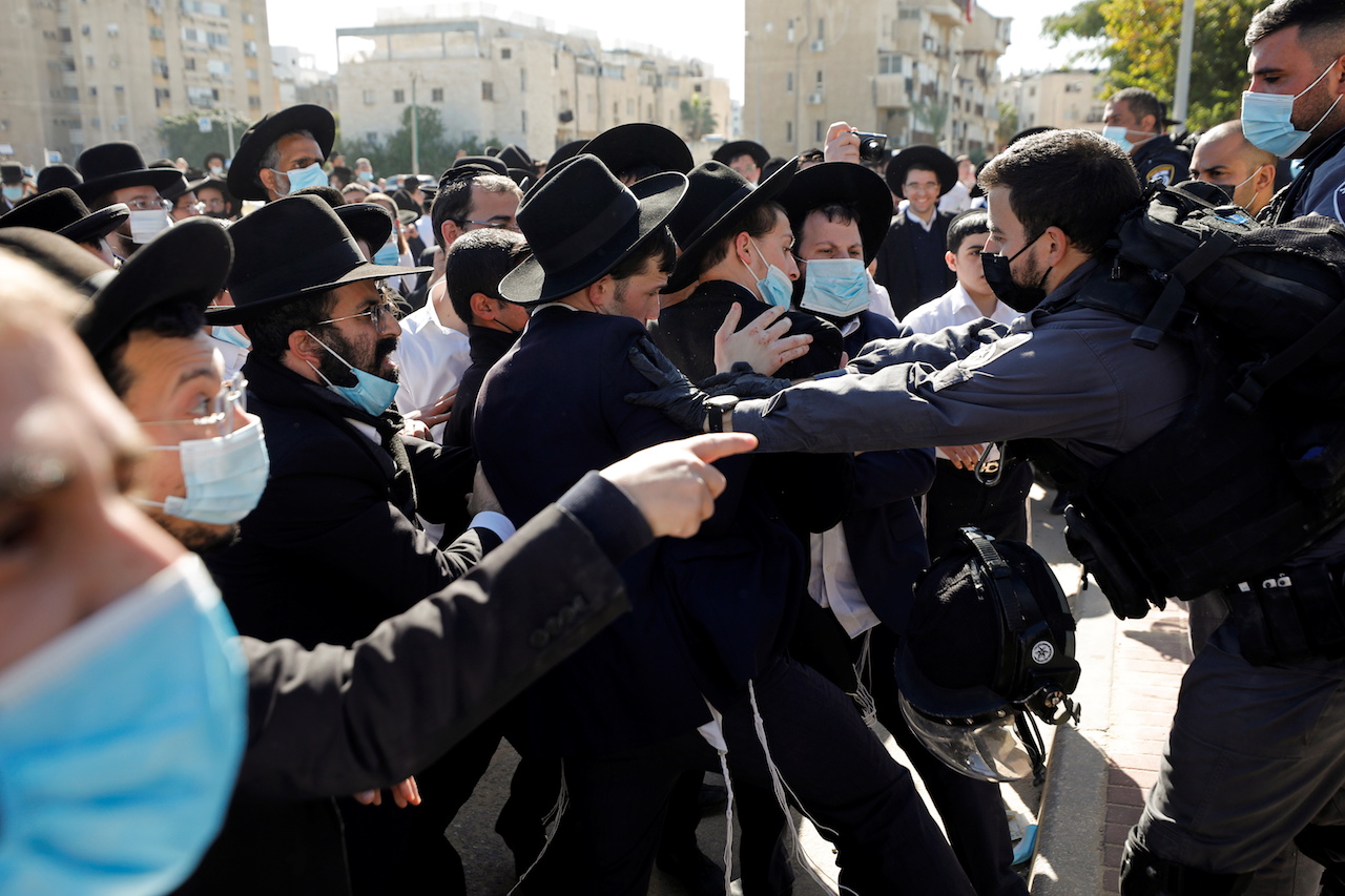 Ultra-Orthodox Jews protest over COVID-19 restrictions in Ashdod (Reuters)