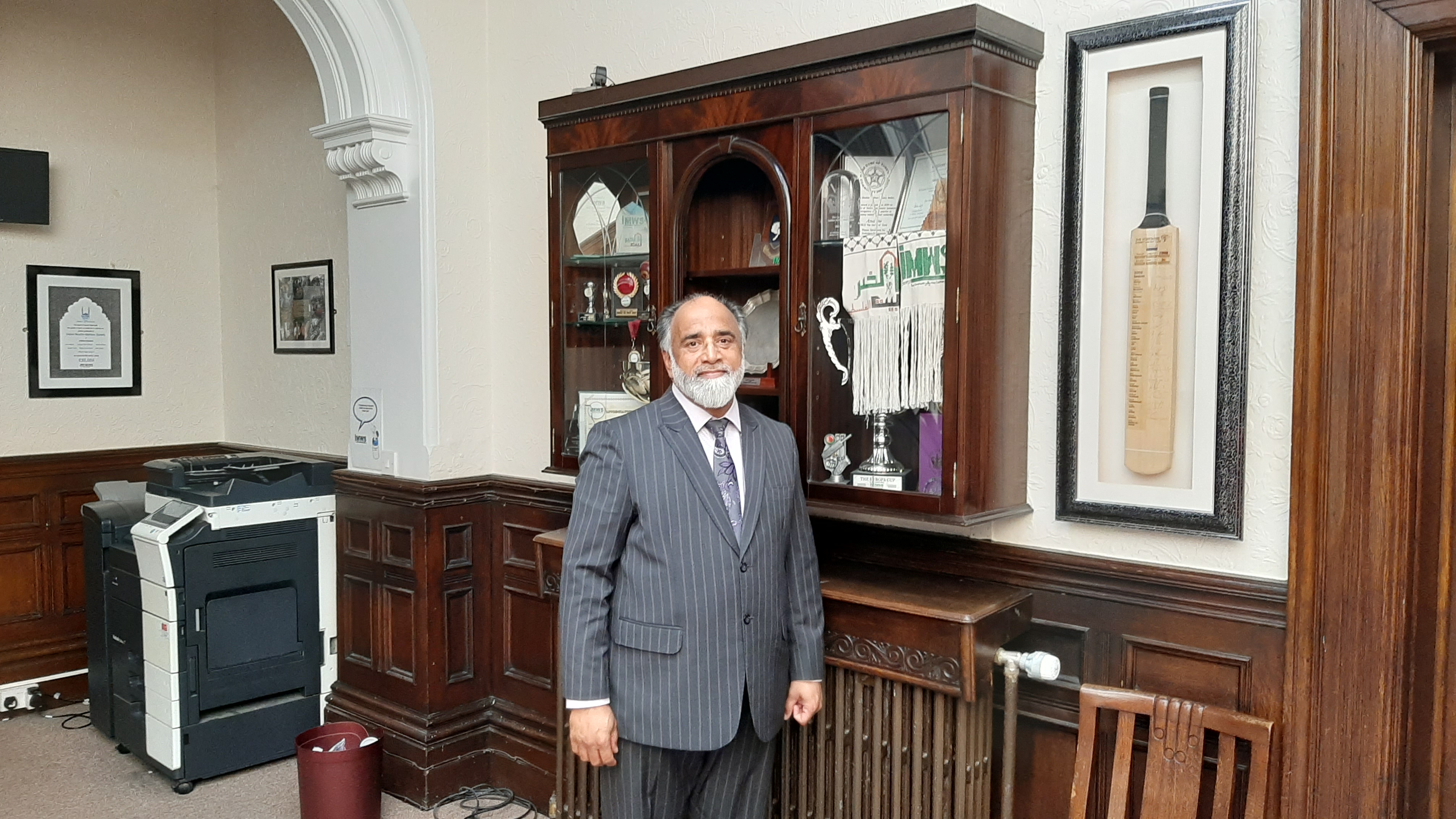 Nadeem Raja, standing in the lobby of the Indian Muslim Welfare Society (MEE/Alex MacDonald)