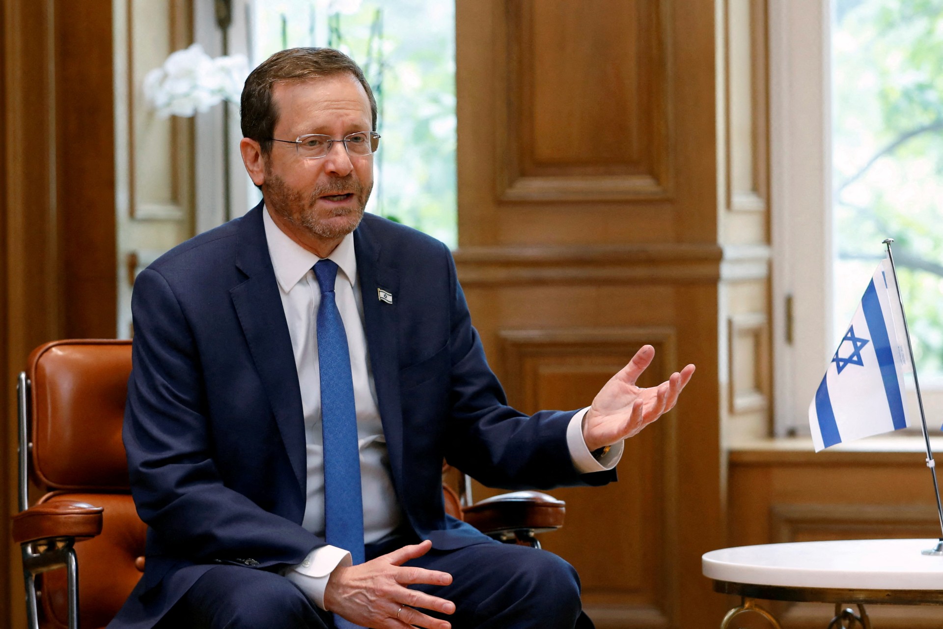 Israeli President Isaac Herzog speaks during his meeting with Greek Prime Minister Kyriakos Mitsotakis in Athens 24 February (Reuters)