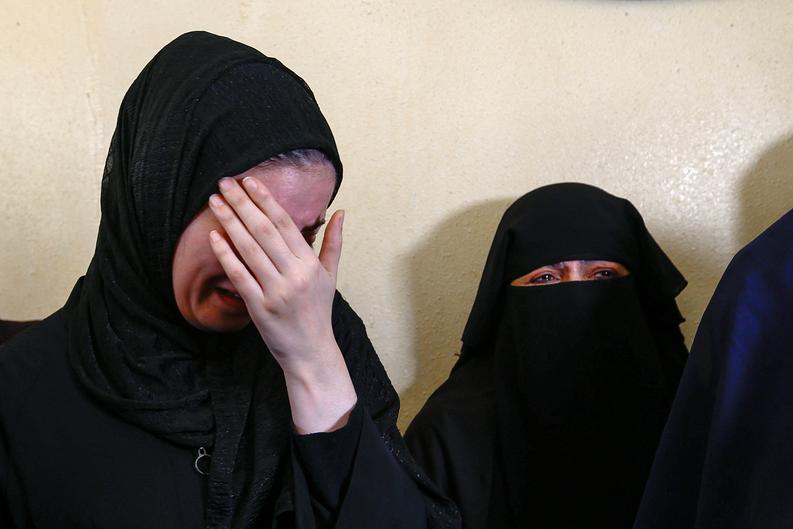 Family of Palestinians killed in pre-dawn Israeli air strikes on 11 May 2023 attend their funeral in the Gaza Strip (Reuters) 