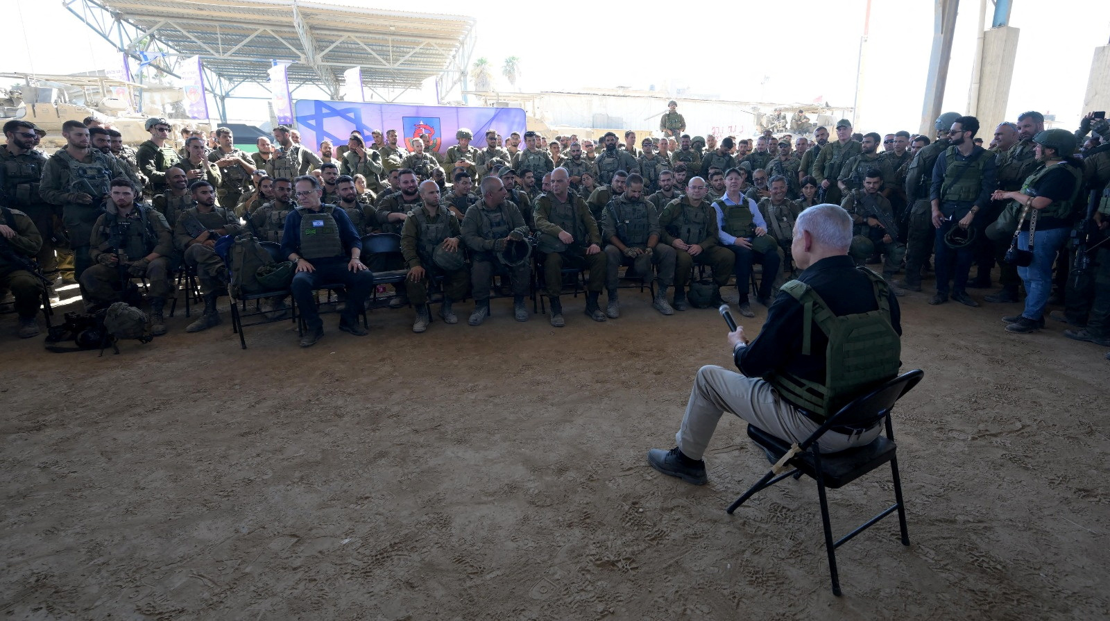 Israeli Prime Minister Benjamin Netanyahu visits Israeli soldiers in Rafah, in the southern Gaza Strip, in this handout picture from July 18, 2024. Avi Ohayon/GPO/Handout via Reuters