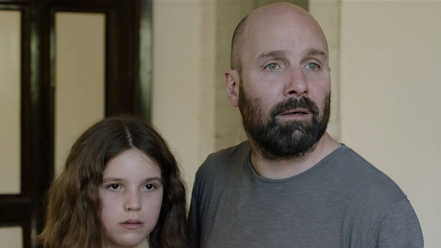 Rebecca's mother dies in a car accident, prompting her father (Johnny Harris) to make the move to Jerusalem (Muayad Alayan)