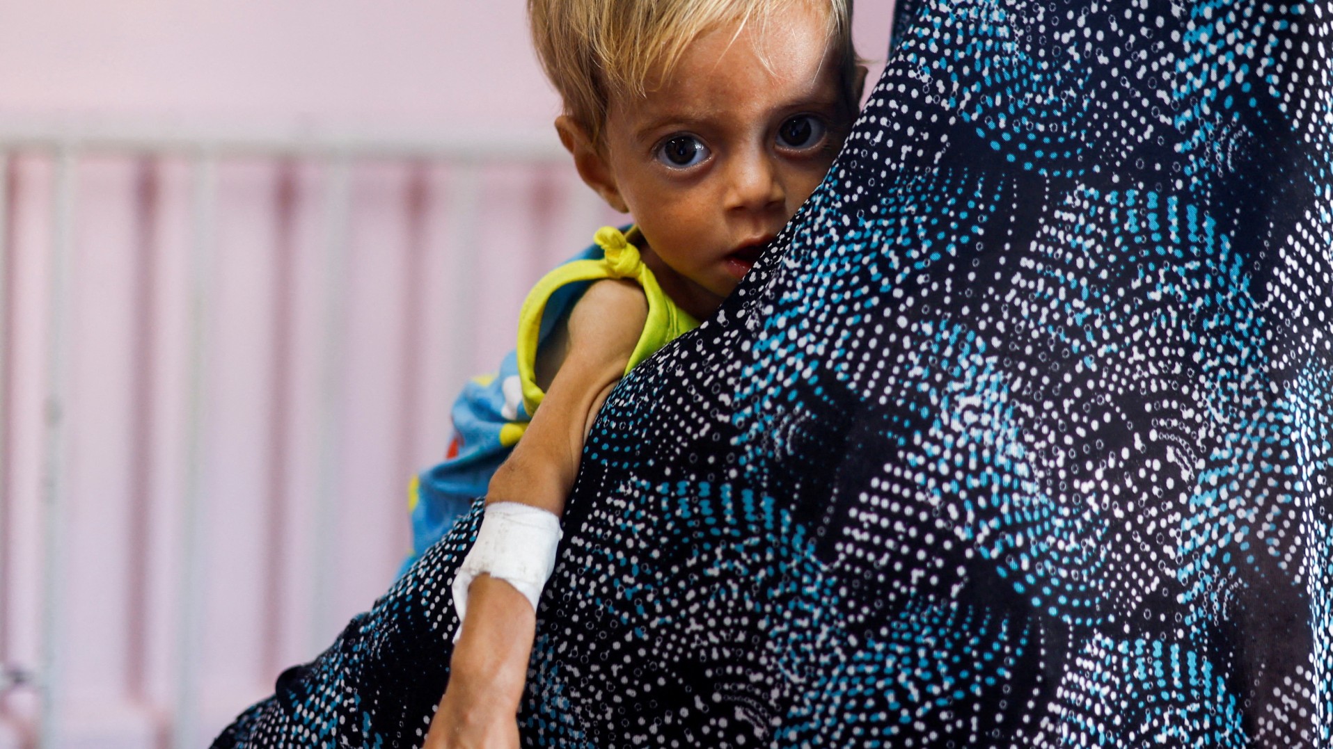 A child looks on at Nasser hospital in Khan Younis, in the southern Gaza Strip, July 8, 2024