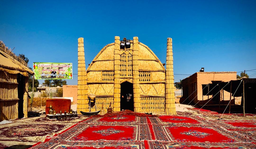 Hamadi and his team recreate traditional homes made out of reeds to showcase Ahwazi-Arab tradition at local festivals