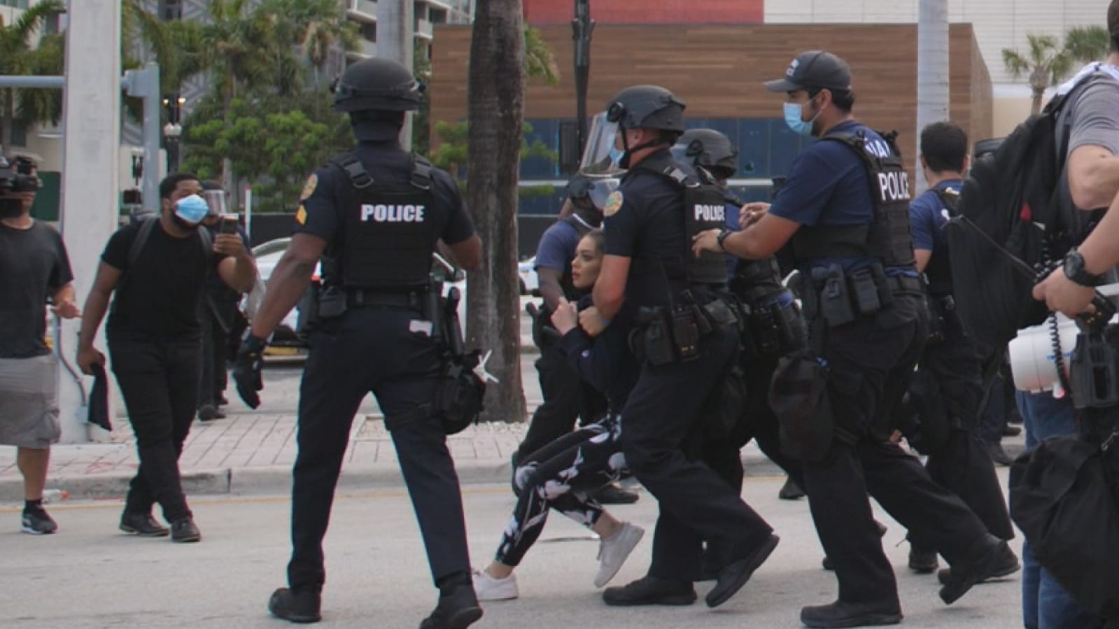 Alaa Massri, 18, being arrested during a protest in Miami on 10 June (CAIR-Florida) 