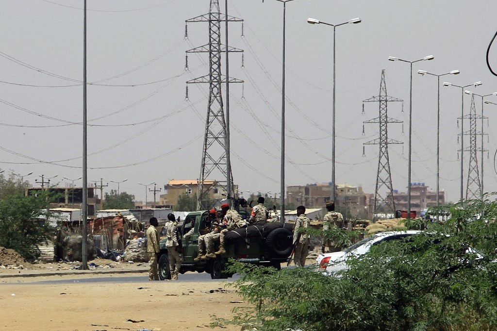 Army soldiers deploy in Khartoum on 15 April 2023, amid reported clashes in the city (AFP)