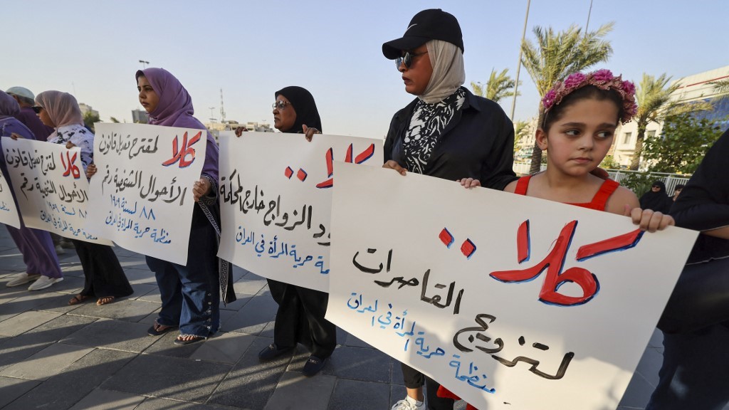 Activists demonstrate against female child marriages in Tahrir Square in central Baghdad on July 28, 2024, amid parliamentary discussion over a proposed amendment to Iraqi Personal Status Law (AFP)