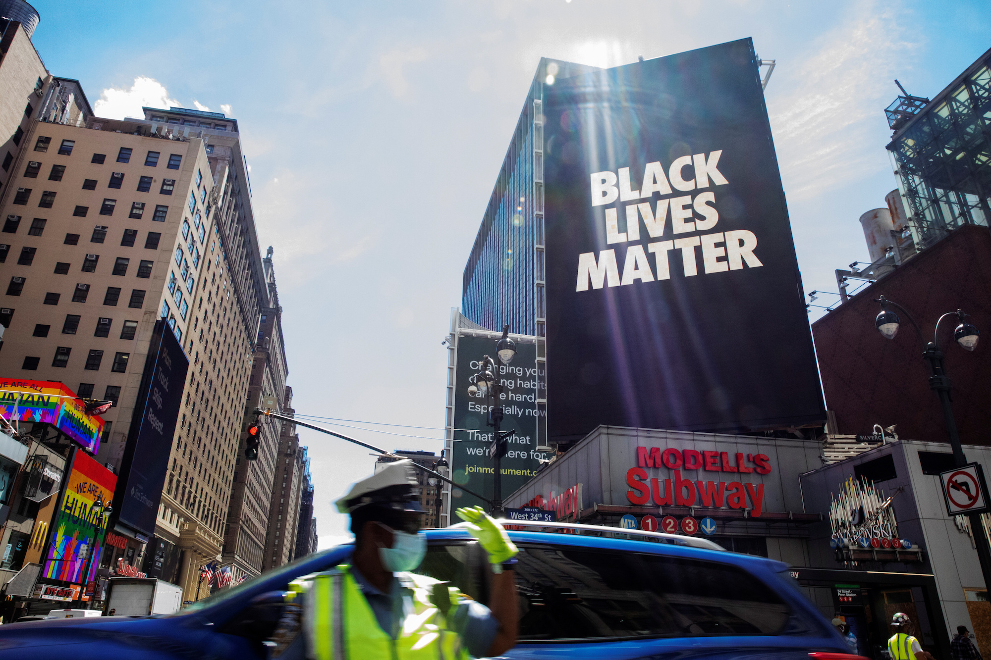 Big screen reading "Black Lives Matter" on a building in New York City