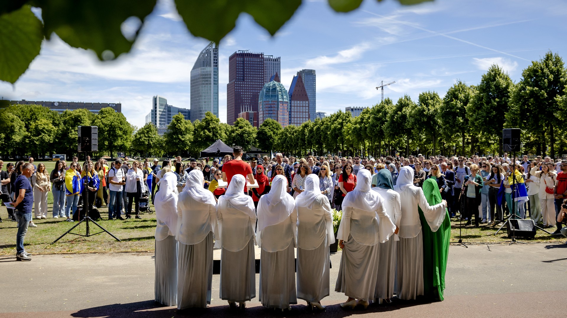 Participants attend an annual remembrance ceremony of the Srebrenica massacre, where Bosnian Serb troops murdered more than 8,000 Muslim men and boys after the fall of an enclave guarded by the Dutch in 1995, on the Malieveld, in The Hague, on July 11, 2022
