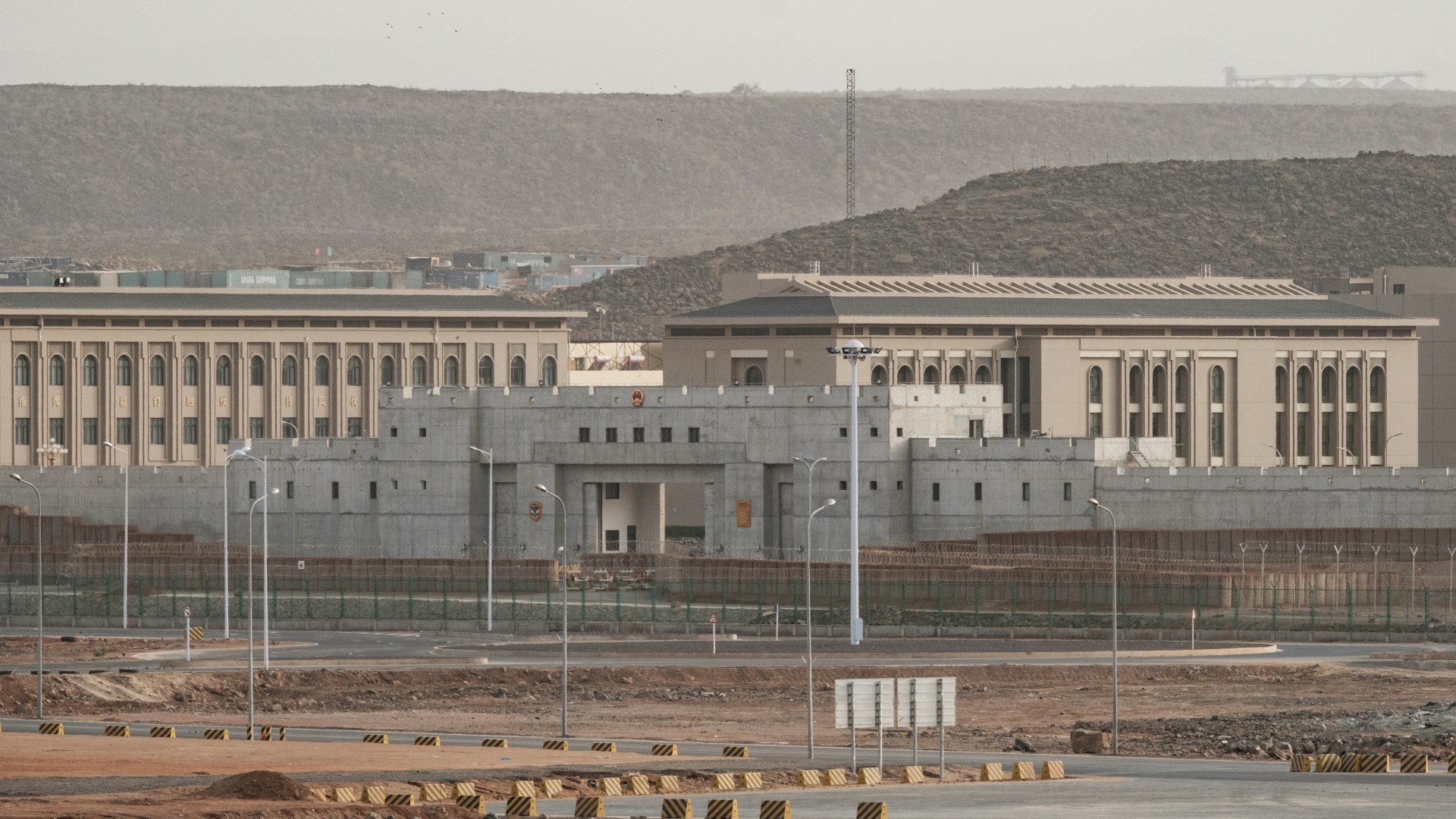 This photograph taken on July 4, 2018, shows buildings of a Chinese military base next to Doraleh Multi-Purpose Port in Djibouti