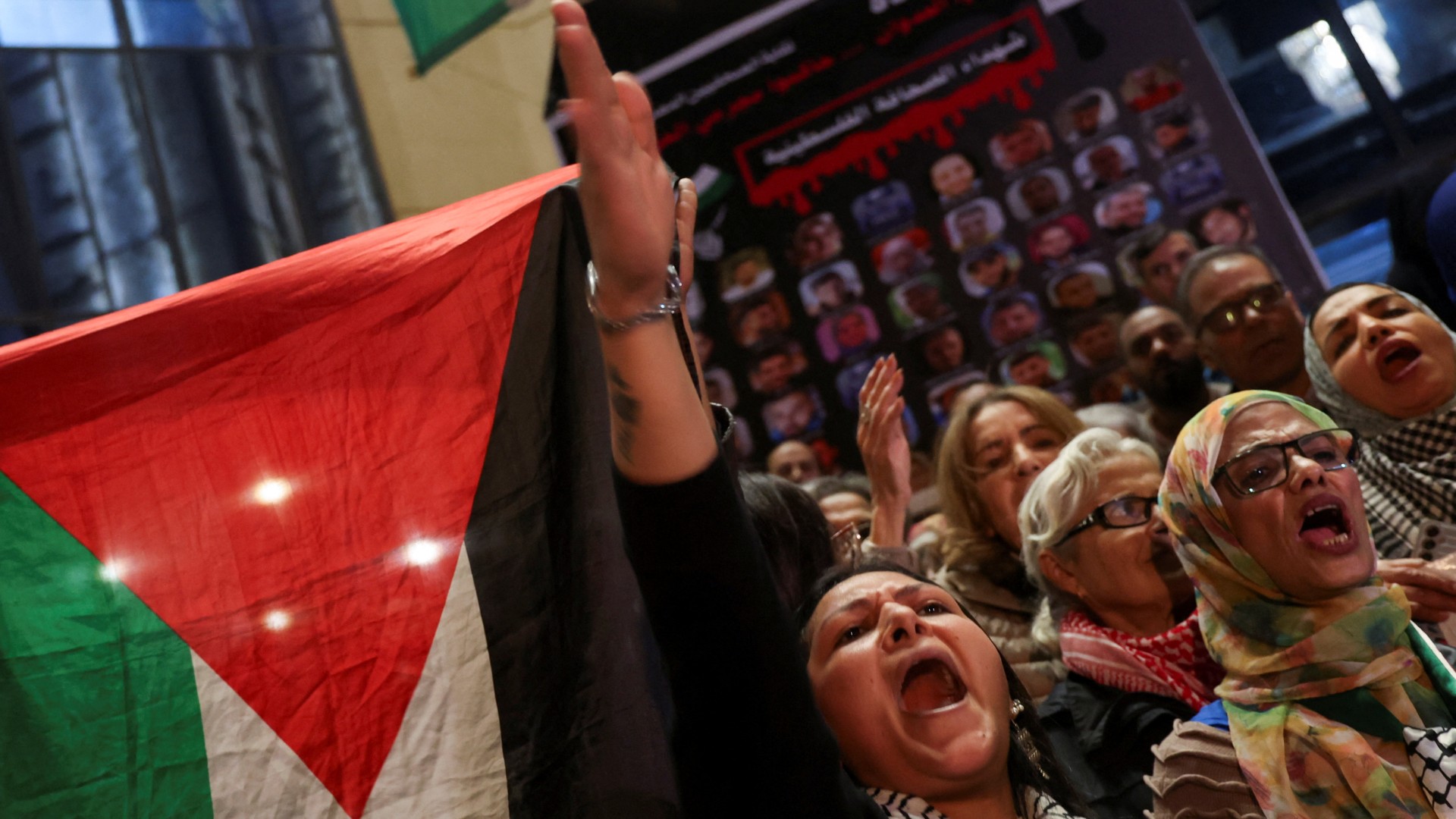 Demonstrators attend a protest against Israel and in support of Palestinians in front of the Egypt Journalists Syndicate in Cairo, Egypt on 15 January, 2024 (Reuters)