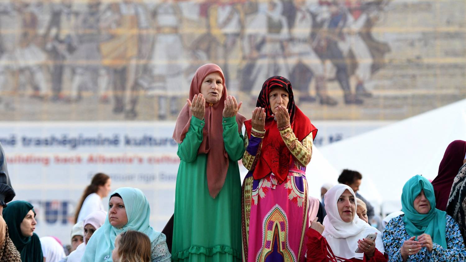 Muslim women gather to pray in Skanderbeg square in Tirana [Gent Shkullaku/AFP] 