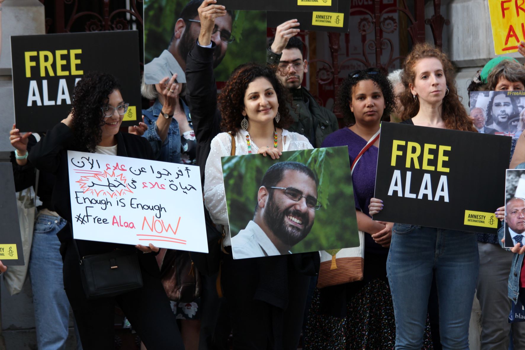 Activists and family of Alaa Abd el-Fattah protest outside the Foreign Commonwealth and Development Office in London (MEE/Alex MacDonald)