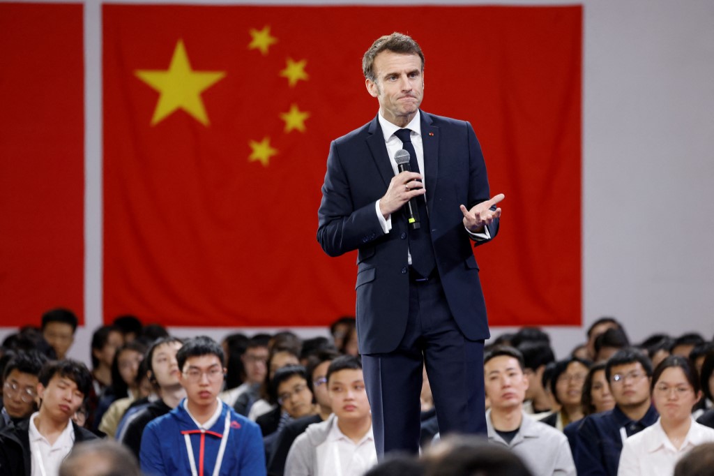 French President Emmanuel Macron speaks to students at Sun Yat-sen University in Guangzhou, China on 7 April 2023 (AFP)