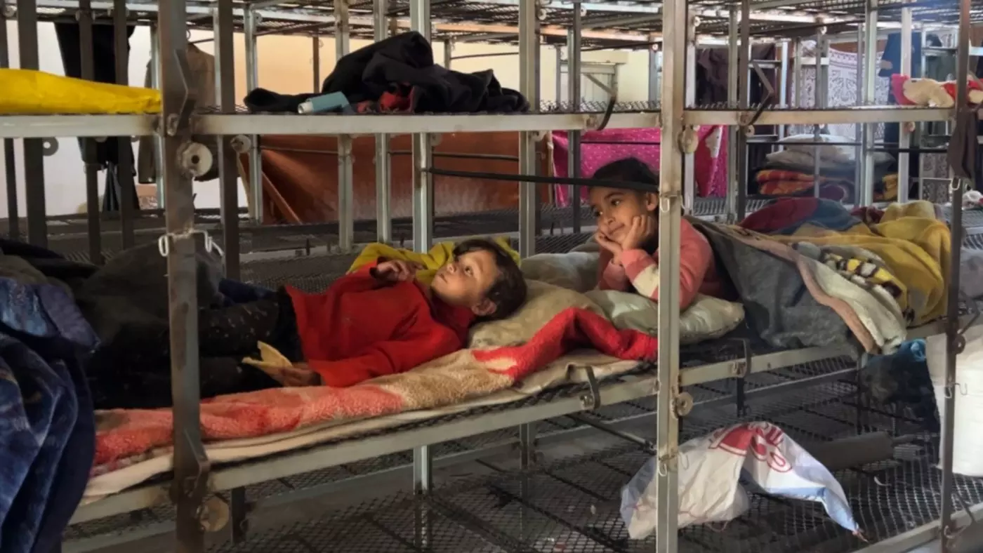 children sleep chicken cages rafah gaza