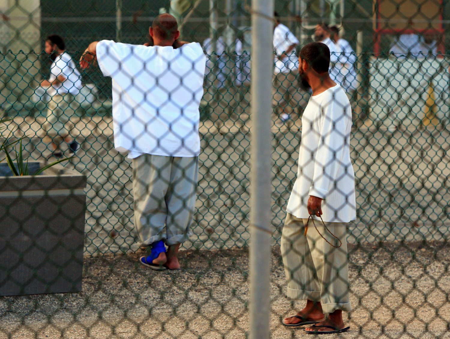 Detainees held by the US at Guantanamo Bay, Cuba, take exercise in May 2009 (Peter Nicholls/The Times)