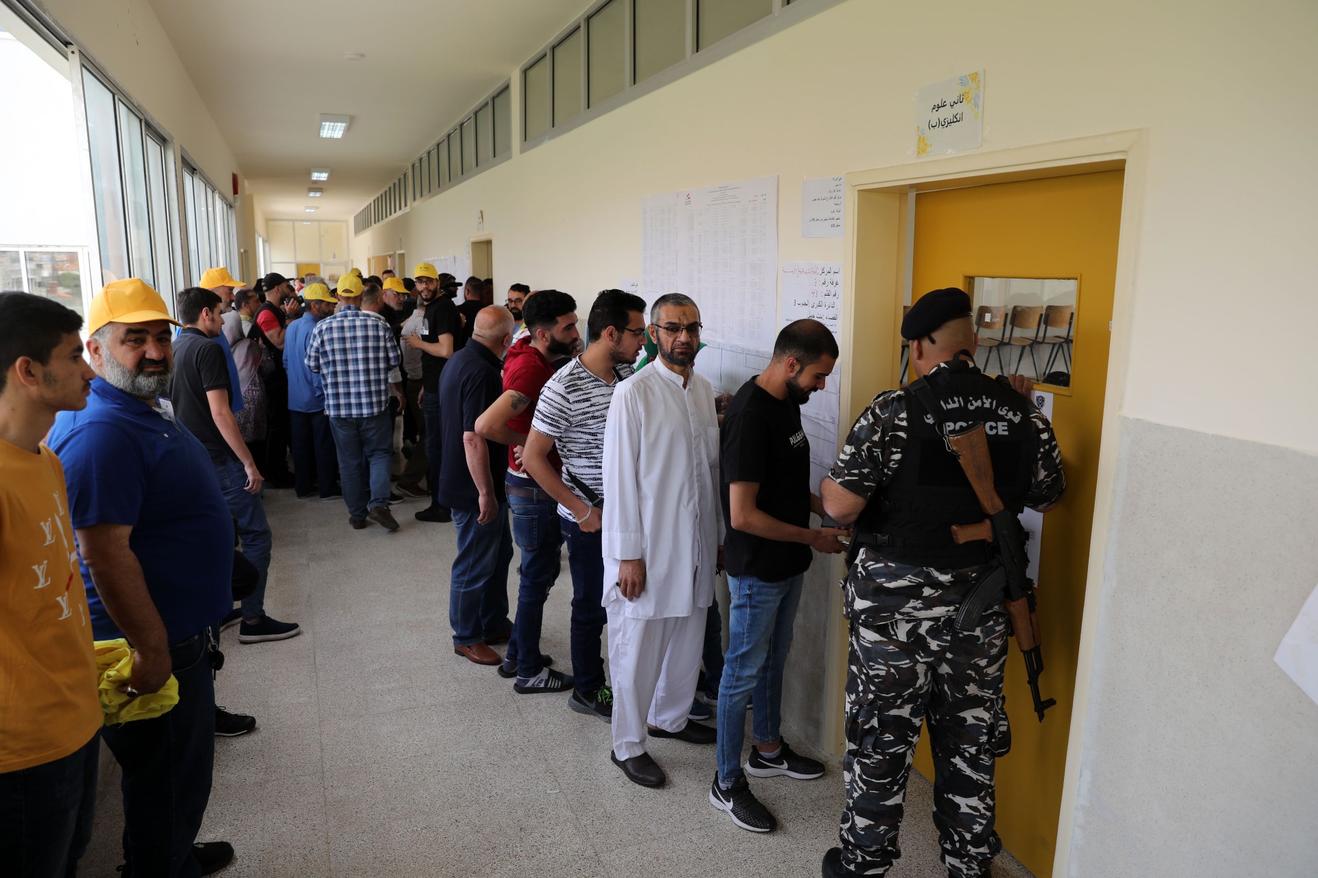People queue at a polling station in southern Lebanon's Bint Jbeil (MEE/Hassan Shaaban)