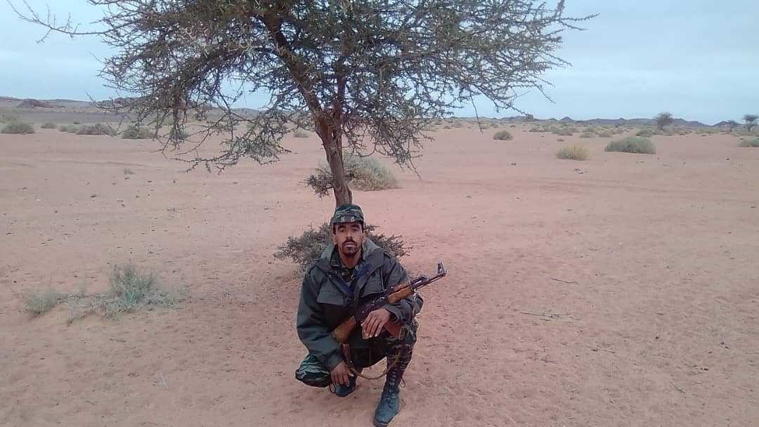 Buda Muhammad Buda clutching an AK-47 in the liberated territories of Western Sahara (supplied)