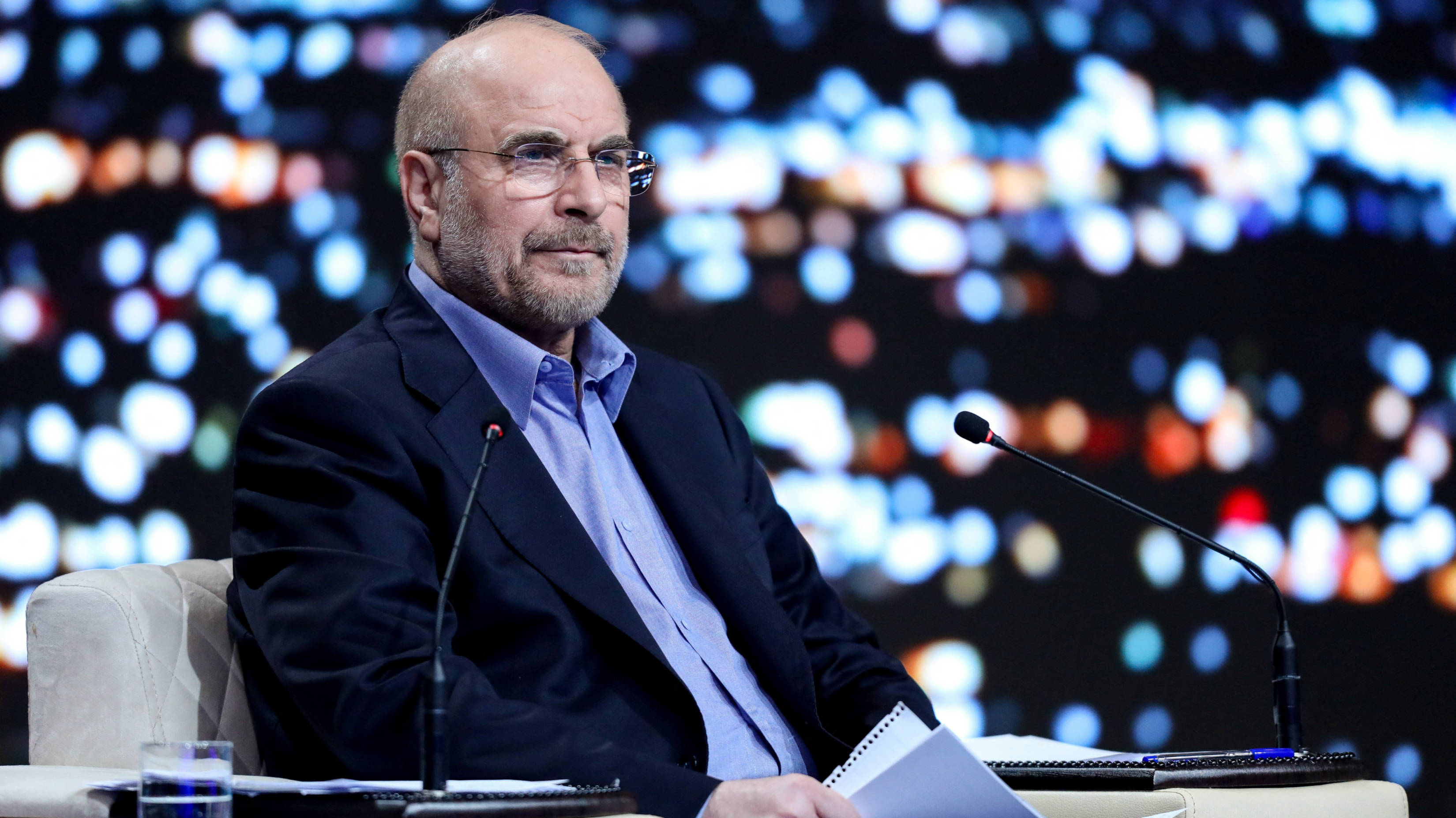 Iranian presidential candidate Mohammad Bagher Qalibaf attends an election debate at a television studio in Tehran, 20 June 2024 (IRIB/Reuters)