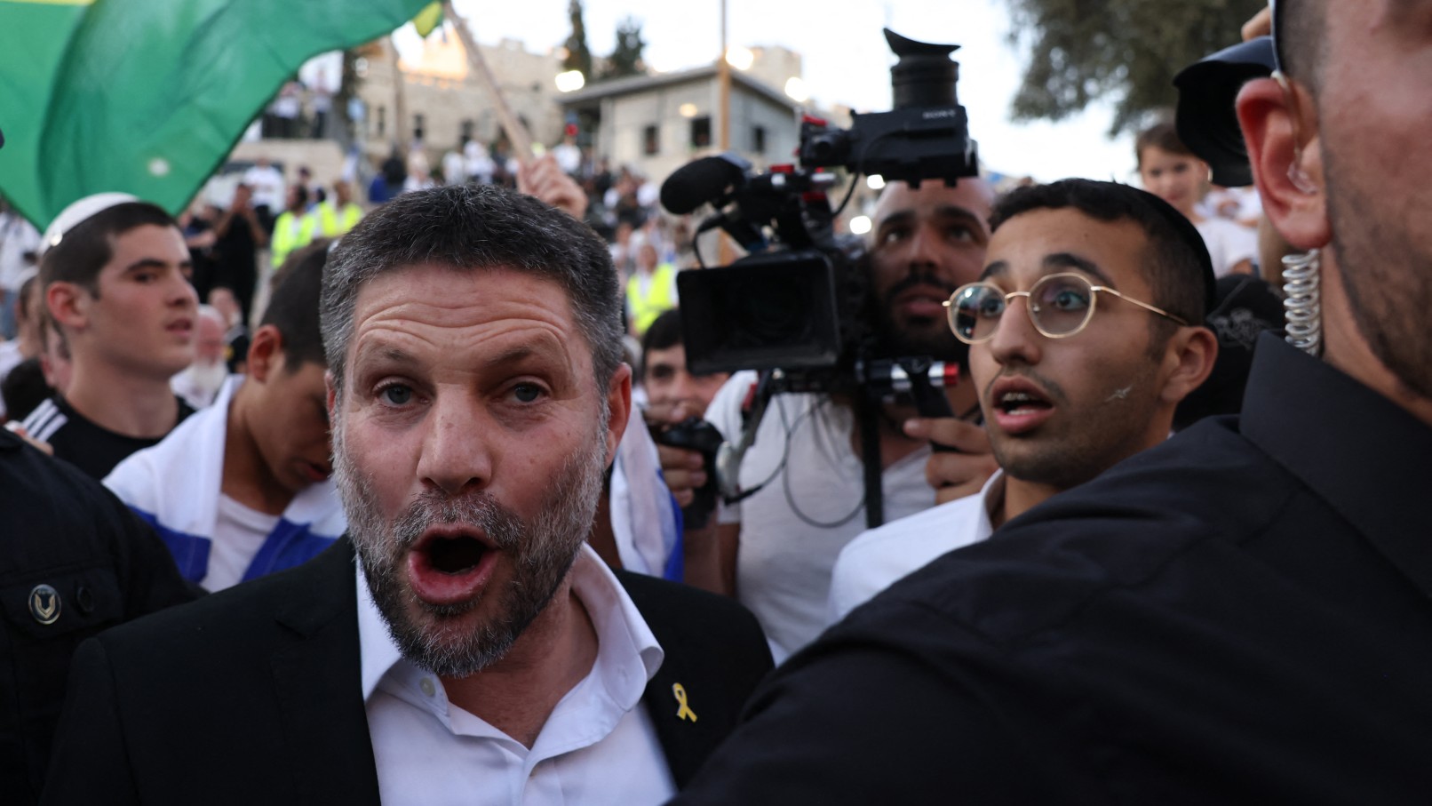 Israel's Finance Minister Bezalel Smotric joins right-wing activists rallying at Jerusalem's Damascus Gate on June 5, 2024 during the so-called Jerusalem Day flag march