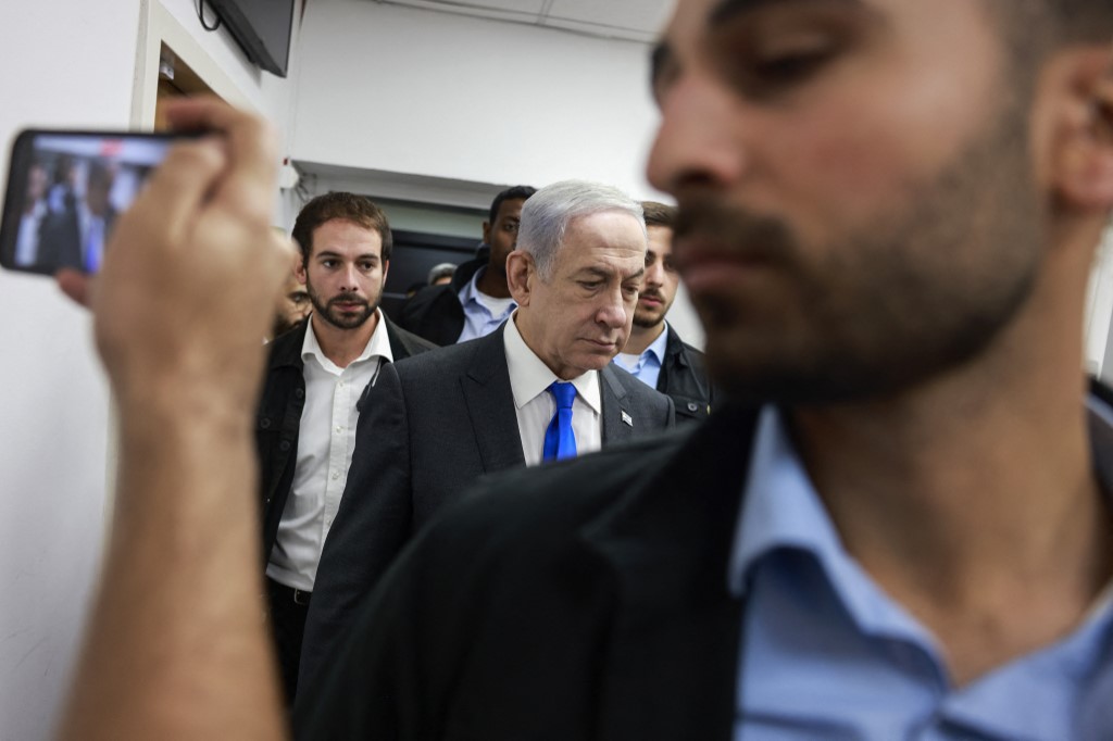 Israeli Prime Minister Benjamin Netanyahu arrives for a cabinet meeting at the Israeli Ministry of Defence, Tel Aviv, 17 December 2023 (AFP)