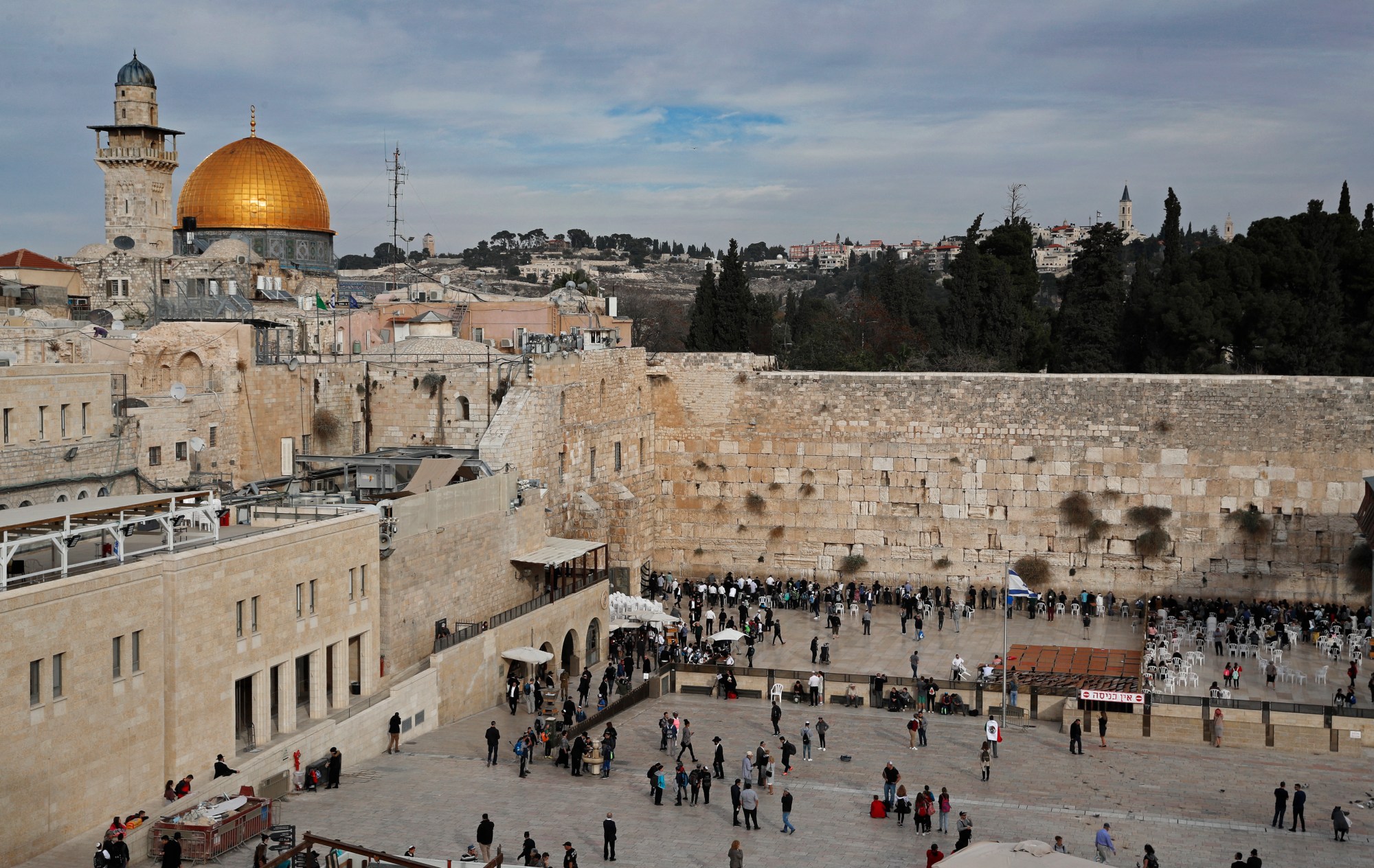 A general view shows the Western Wall plaza, where the Moroccan Quarter once stood, and the Dome of the Rock in the Al-Aqsa mosque compound in the Old City of Jerusalem on 5 December 2017 (AFP)