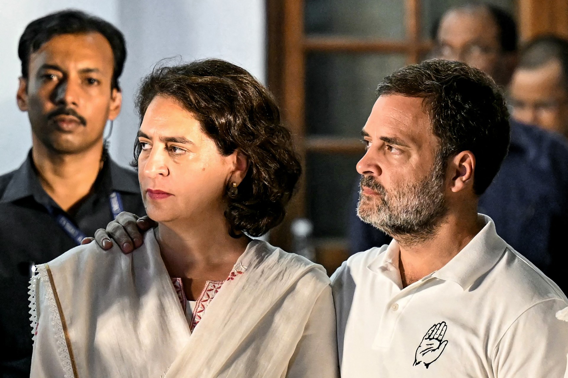 Leaders of Indian National Congress (INC) party Rahul Gandhi (R) and his sister Priyanka Gandhi Vadra (C) on the following day of voting results for India's general election on 4 June, 2024 (AFP)