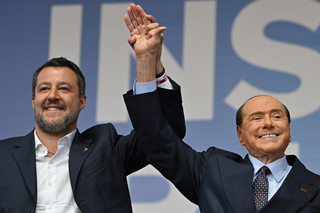 League leader Matteo Salvini (L) and Forza Italia leader Silvio Berlusconi at a joint rally in Rome, ahead of the country's general election, 22 September 2022 (AFP)
