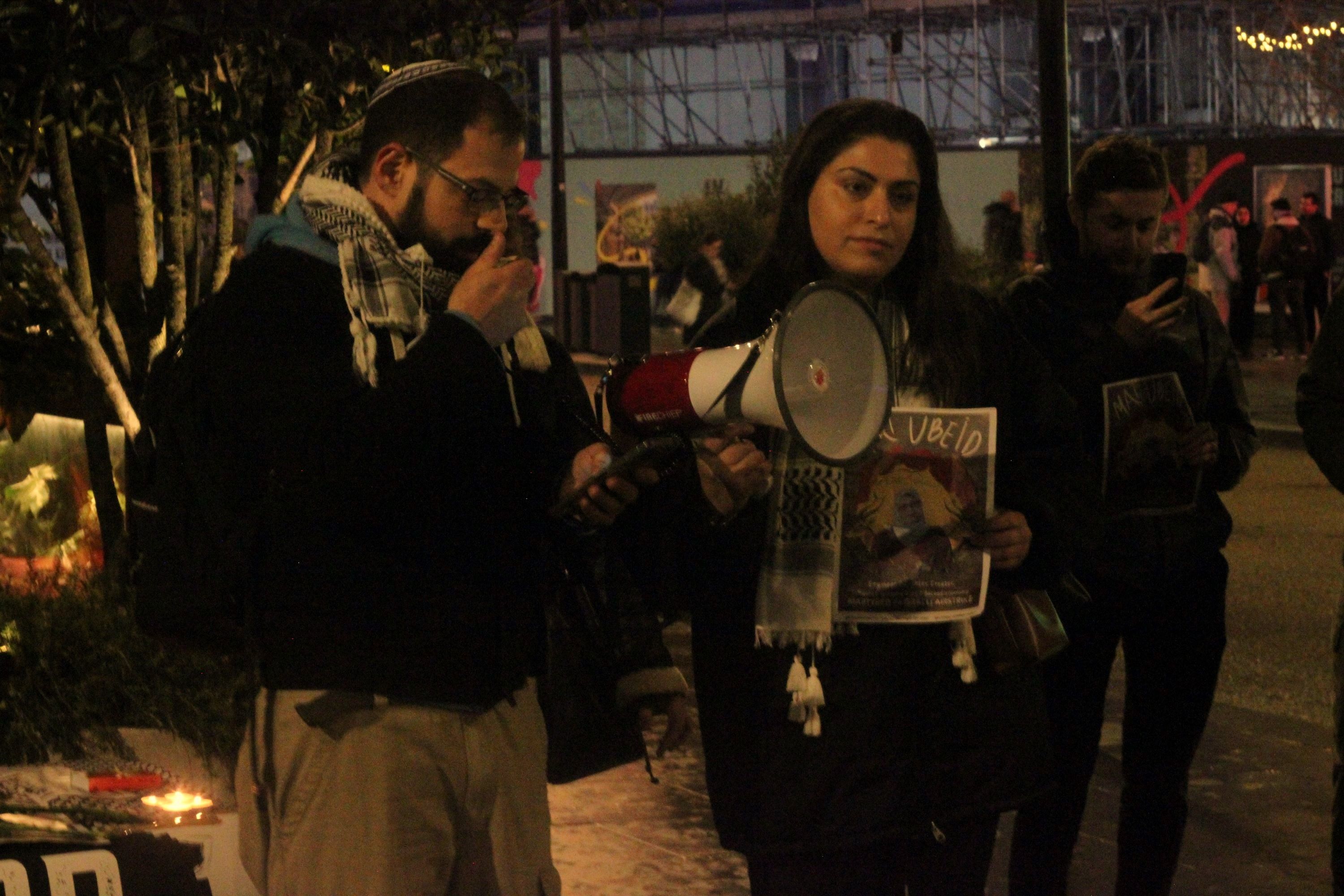 Campaigners speak at the vigil for Mai Ubeid outside Google's offices in London (MEE/Alex MacDonald)