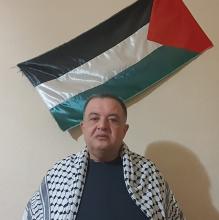 Muhammad Walid, de Jérusalem, estime que son keffieh représente la lutte palestinienne (Muhammad Walid)