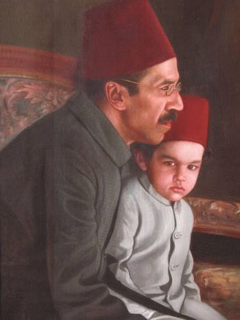 A young Mukarram Jah seen here in the lap of his father Azam Jah (National Archives)
