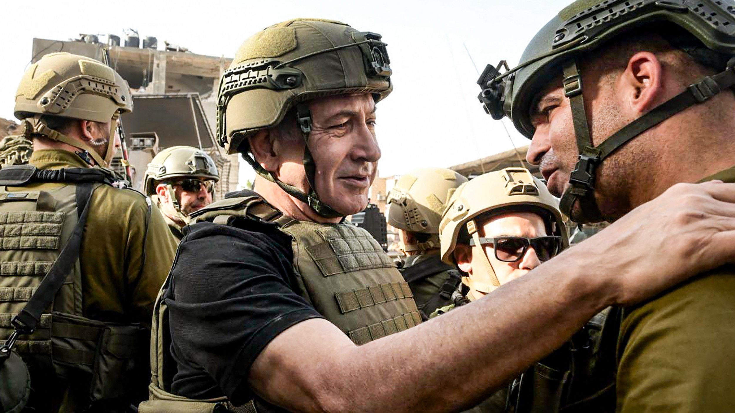 Israeli Prime Minister Benjamin Netanyahu meets soldiers in the Gaza Strip (AFP/Israeli prime minister's office)