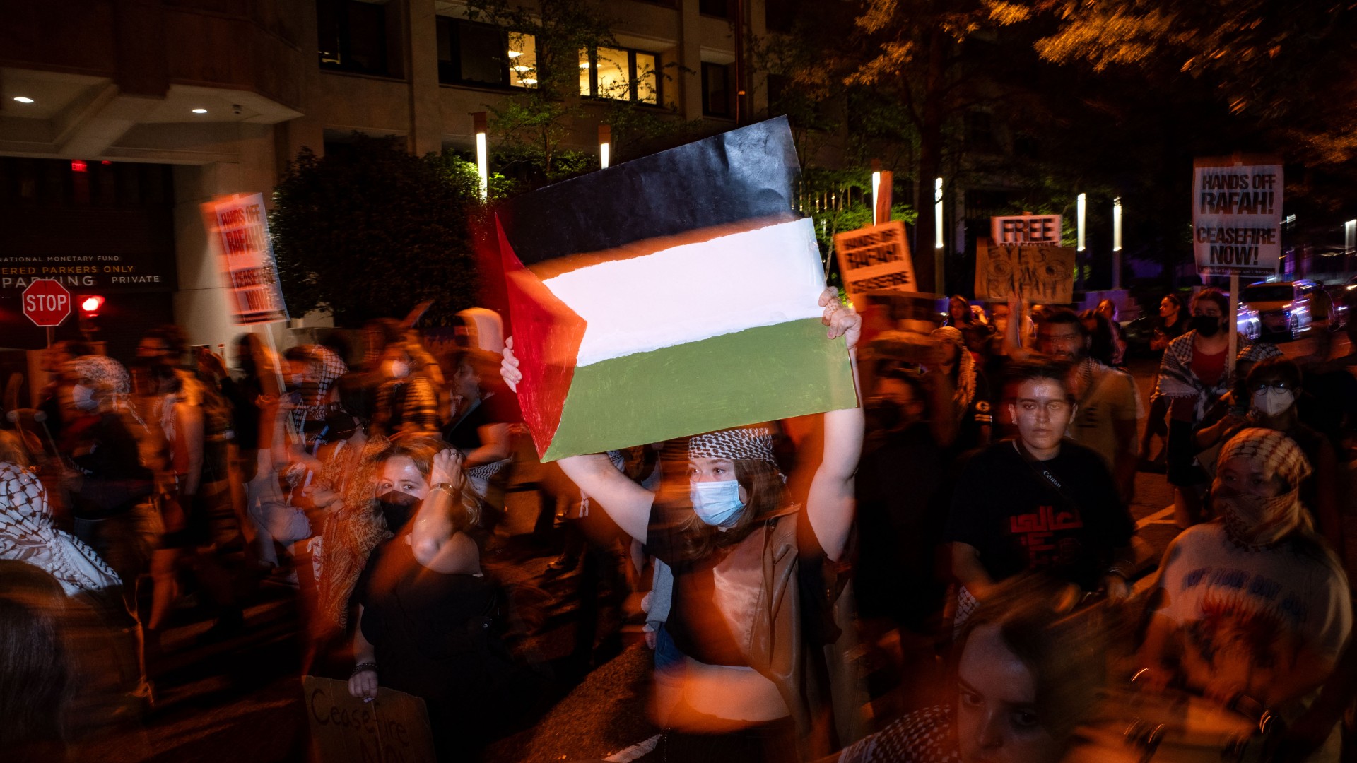 Pro-Palestinian demonstrators march back to George Washington University's University Yard on May 7, 2024 in Washington, DC