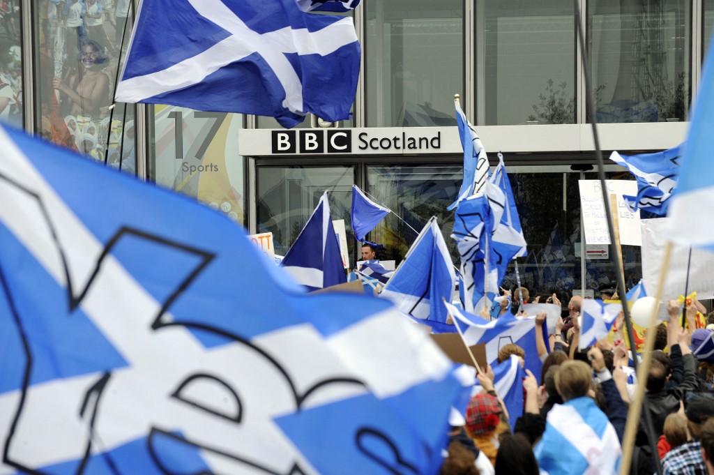 Pro-independence campaigners gather outside BBC Scotland headquarters in Glasgow on 14 September 2014 to protest against alleged biased by the BBC in its coverage of the Scottish referendum (AFP)