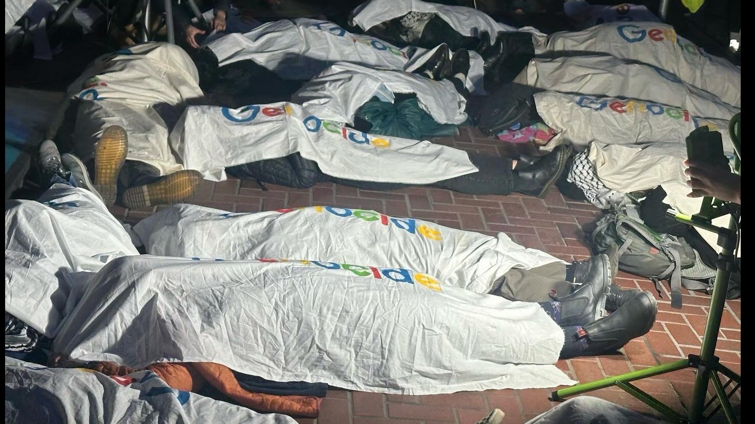 Tech workers and activists stage a die-in to protest Google's Project Nimbus (Supplied: No Tech 4 Apartheid)