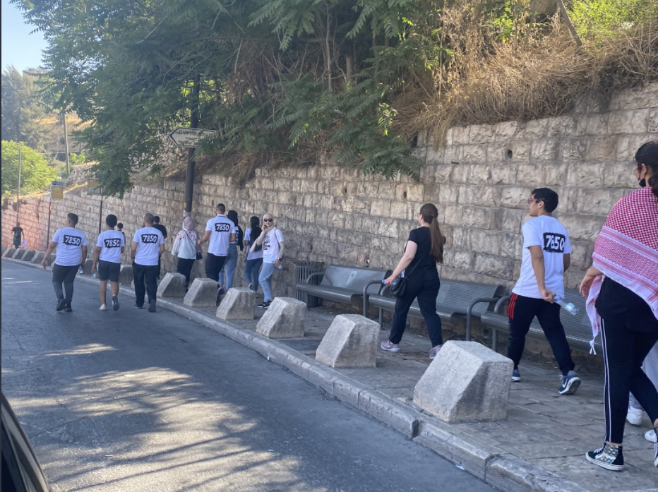 Participants of the run can be seen with the number 7850 on their backs