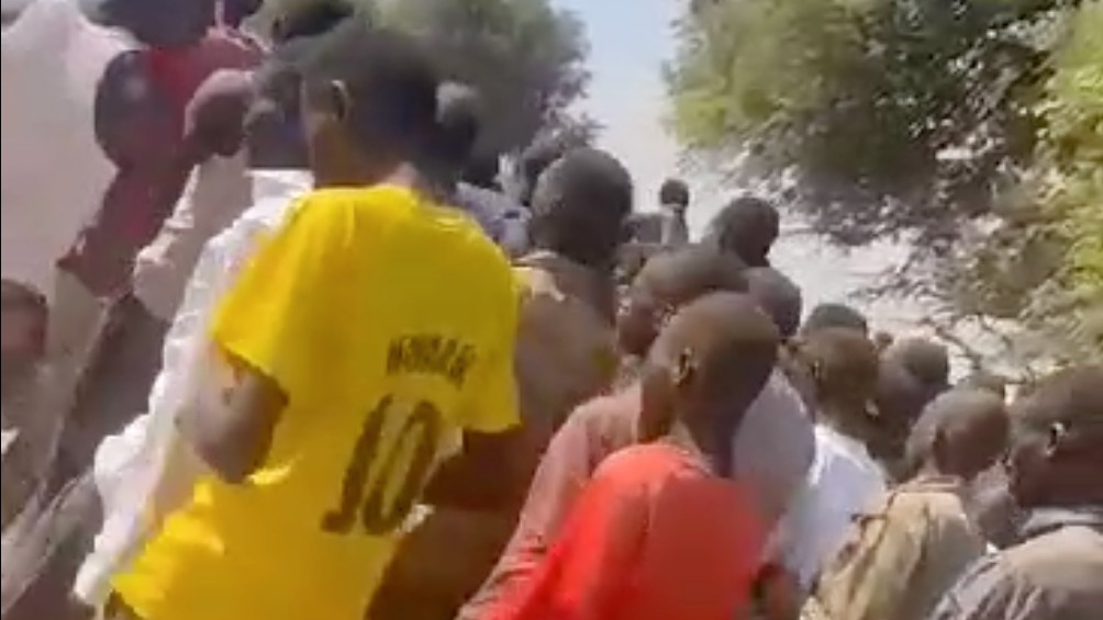 A screenshot of a video purportedly showing Sudanese soldiers and Massalit fighters in RSF captivity outside Ardamata (MEE)