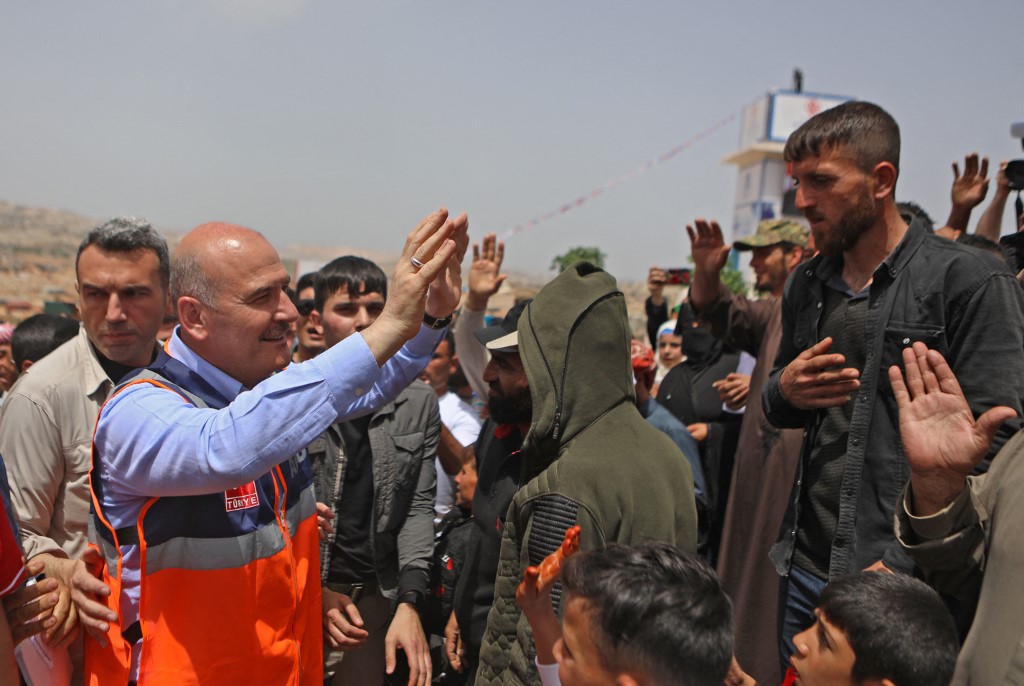 Turkish Minister of Interior Suleyman Soylu arrives to inaugurate a housing complex for internally displaced Syrians built with Turkey's support, in Syria's Idlib province, 3 May 2022 (AFP)