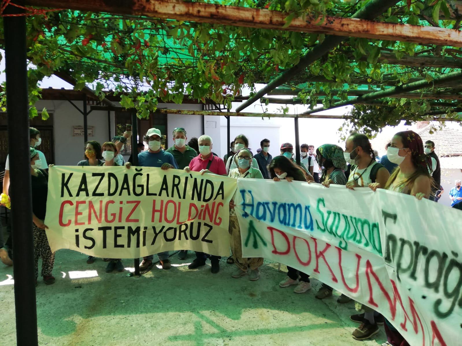 Activists hold up a banner reading 'we don't want Cengiz Holding in Mount Ida' (Kazdagi Association)