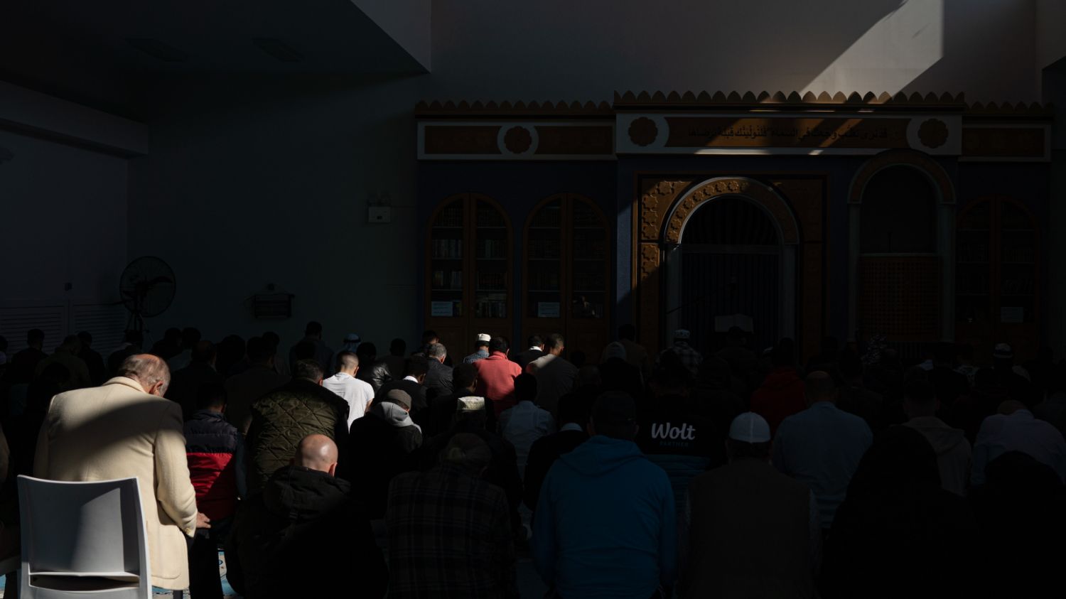 Worshippers from various backgrounds congregate at the Athens mosque, united in prayer (Patrick Strickland/MEE)