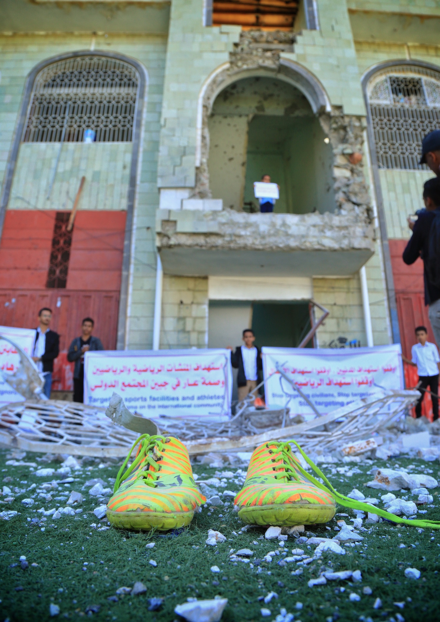 Yemen Taiz Raimi shoes football stadium bombing protest MEE Khalid Al-Banna