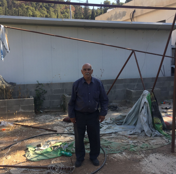 Adel Jabori, a resident of Wadi Yasul, says the ultimate aim it to uproot the Palestinians, their buildings, trees and families (MEE/Jan-Peter Westad)