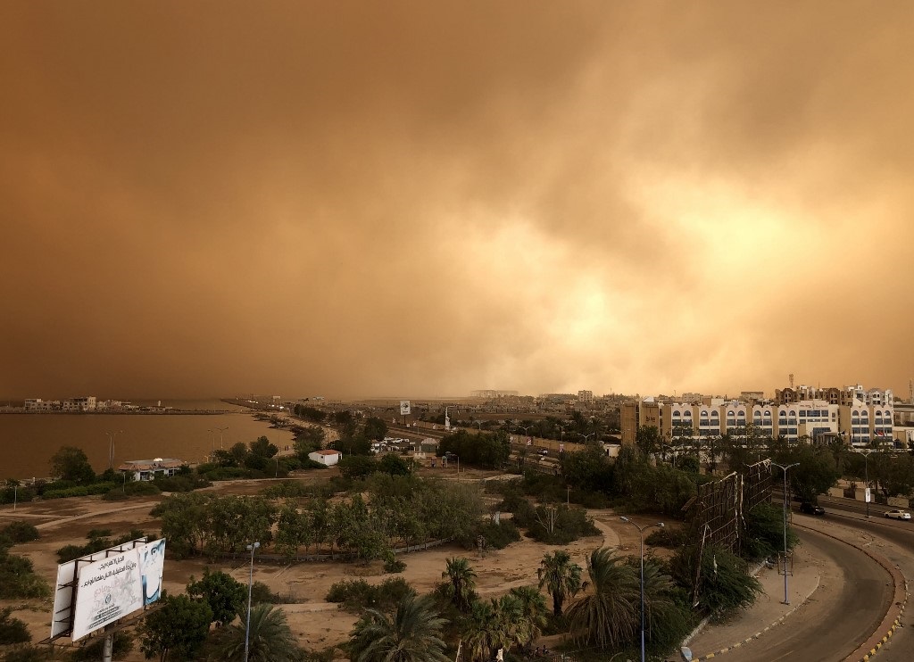 A sand storm approaches Aden in September (AFP)