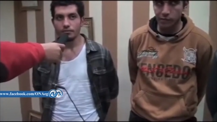 Ahmed el-Shal (L) appears on television with two other defendants (Screenshot)