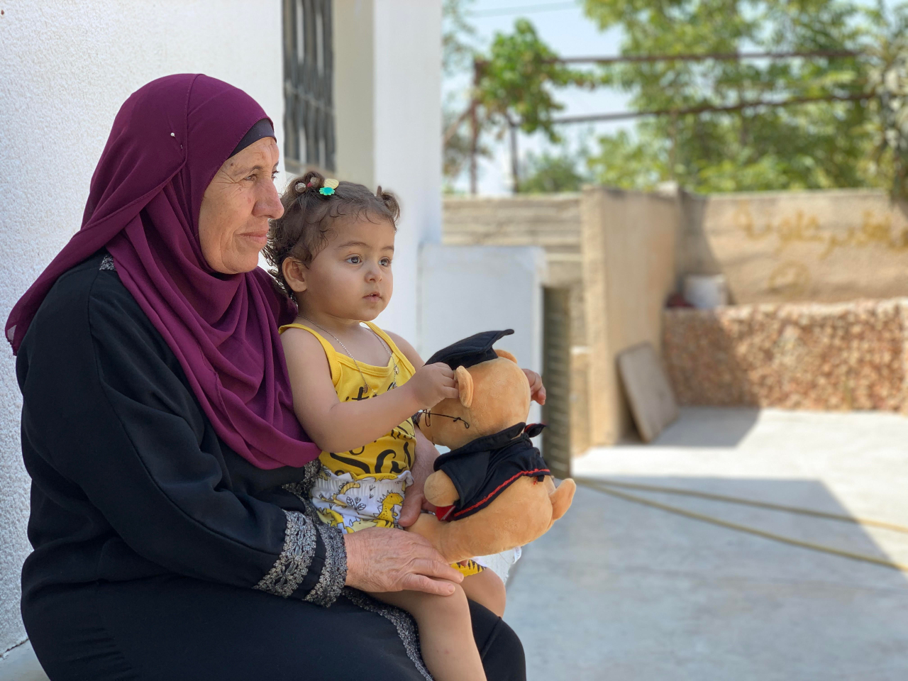 Anhar’s mother, 57-year-old Aisha, now spends her time looking after her one-and-a half-year-old granddaughter Julia (Shatha Hammad)