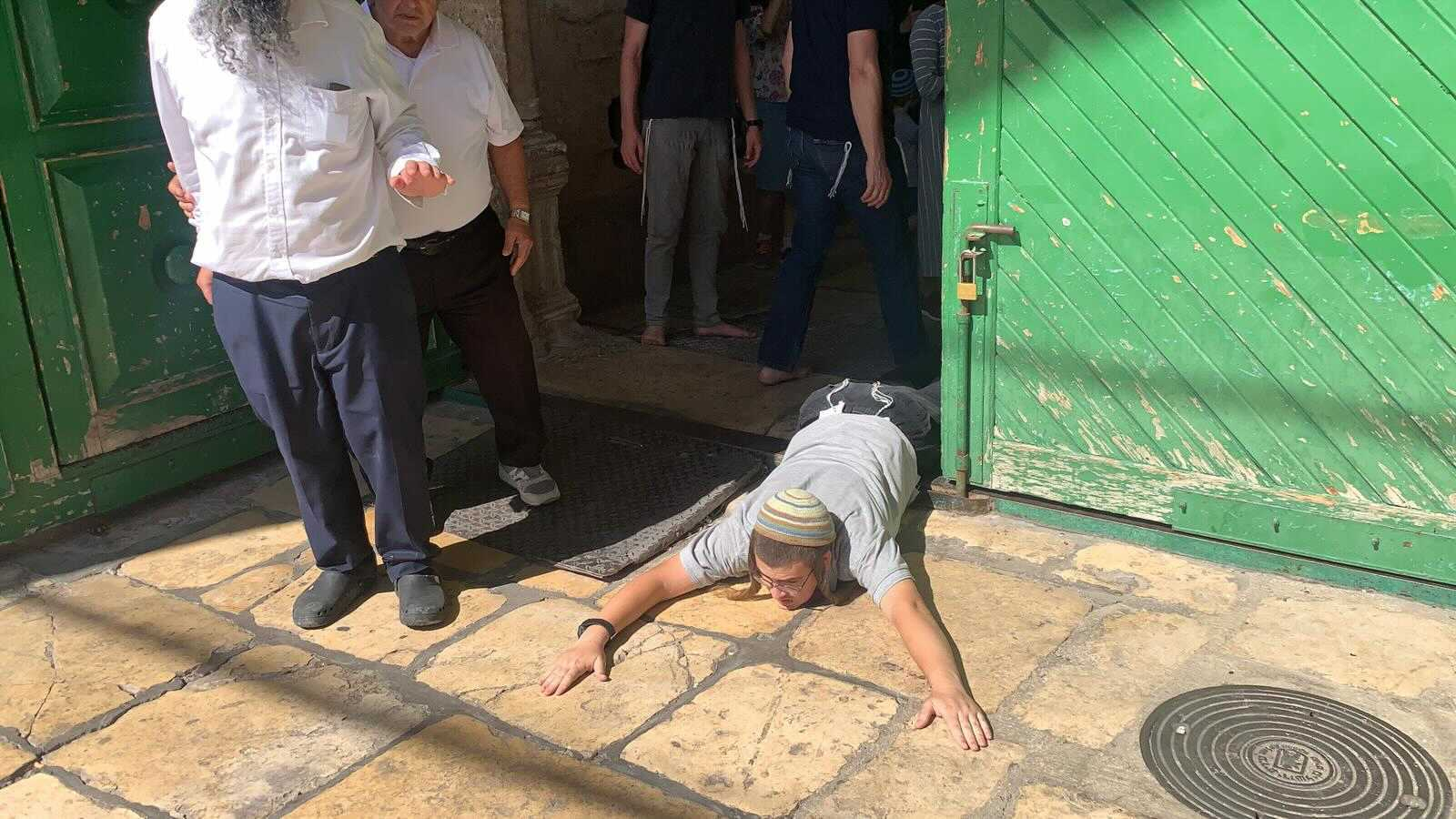A settler breaks into al-Aqsa Mosque compound on Sunday (MEE)