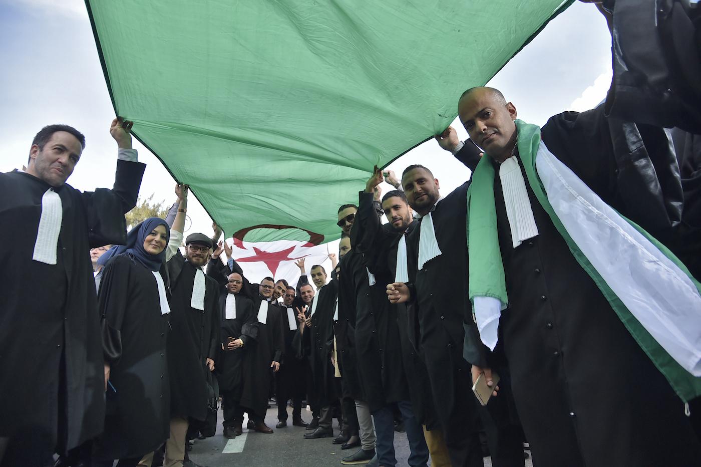 Lawyers protest against Abdelaziz Bouteflika's candidacy in Algiers on 7 March (AFP)
