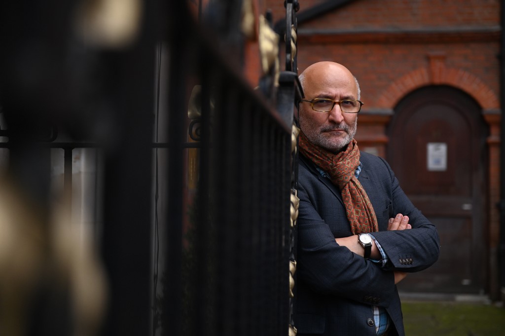 Coup 53 director Taghi Amirani poses in London on 4 October 2019 (AFP)